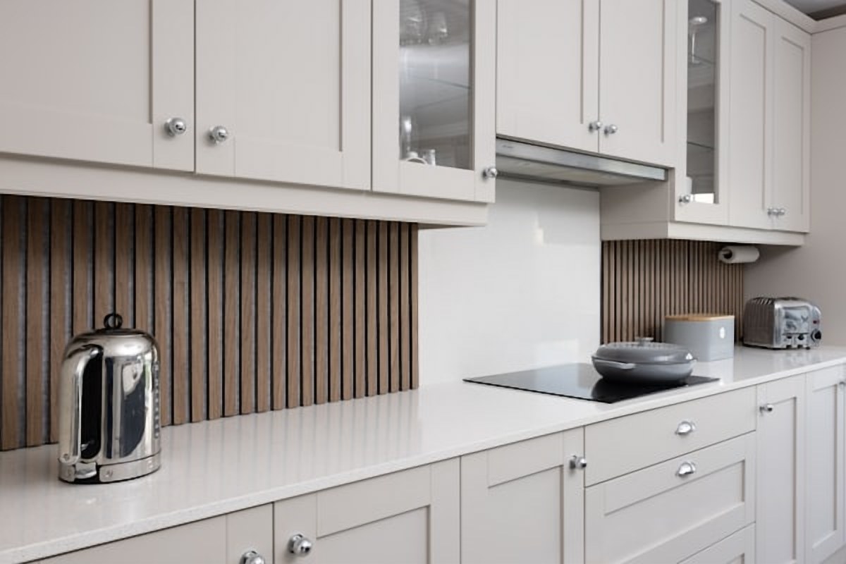 L-shaped kitchen with island in Wash Park